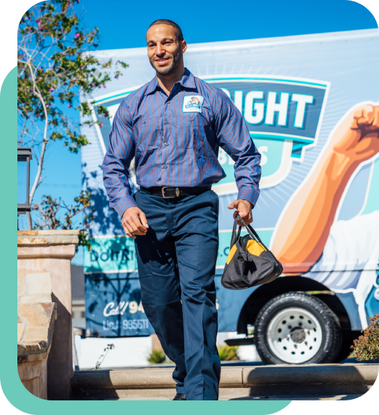 A man in business attire walks outdoors carrying a small bag, with a branded service truck and blue sky in the background—showcasing the Do It RIght commitment to professionalism.